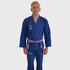 athelete walking in a blue brazillian jiu-jitsu gi